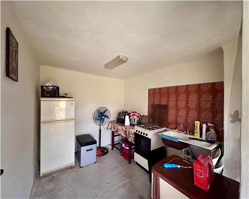 Vanzare casa 6 camere, in Baicoi, teren 1800 MP